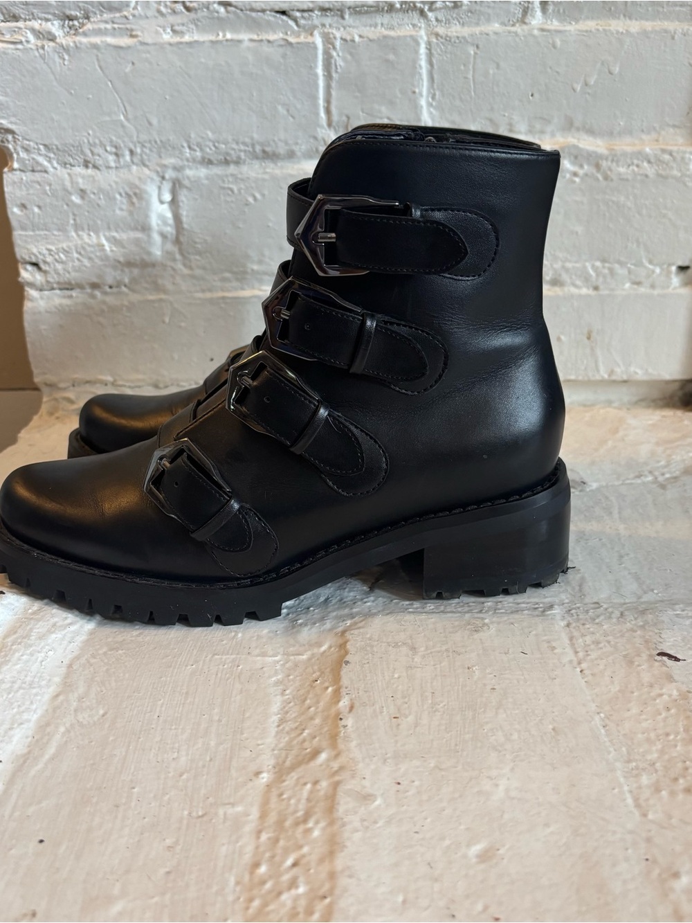 Blondo Black Four-Buckle Waterproof Combat Ankle Boots